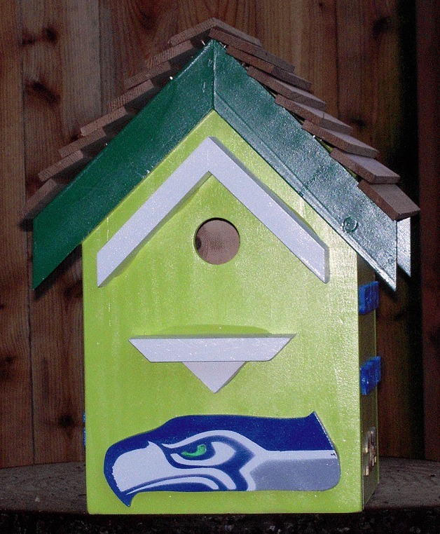 The Williams family in Sammamish received a birdhouse as a Christmas gift  in 2014. Sally Williams says she loves birds and her husband loves the 'Hawks. 'What could be better?' Send us your best photos of 12th Man pride