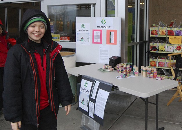 Noah Searles raising money for Treehouse outside Fred Meyer in Issaquah.