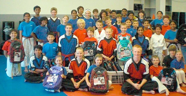 Members of True Martial Arts in Sammamish helped raise money to purchase 24 backpacks to be distributed by Issaquah Food Bank to local children in need. The students were attending the organization's summer camp. True Martial Arts is located at 2912 228th Ave. SE‎.