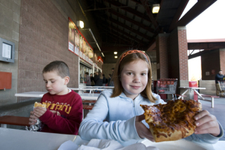 7-year-old Tristan Griffith and his 10-year-old sister Hannah enjoy a quick lunch at Costco