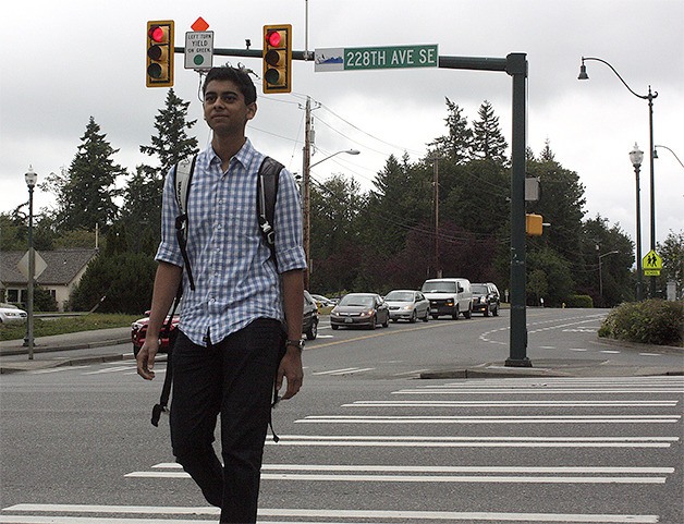 Tesla STEM High School junior Suraj Buddhavarapu walks across 228th Avenue