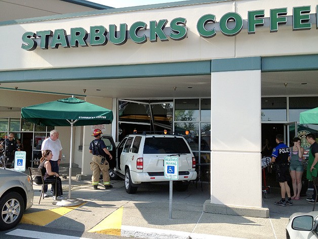 A white SUV crashed through the Pine Lake Starbucks shortly after 5 p.m.