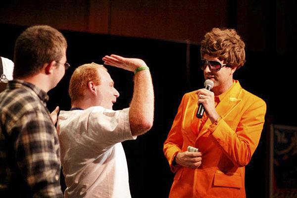 Capernaum performers get ready to receive their $1 prize from talent scout 'Ricky Dorn'