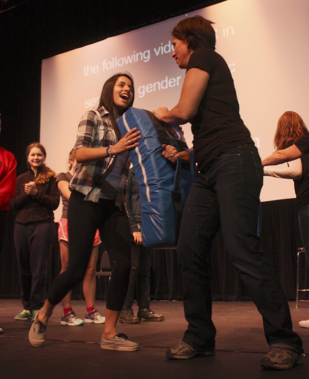 Soraya Marashi practices groin kicks with teacher Karin Walen.