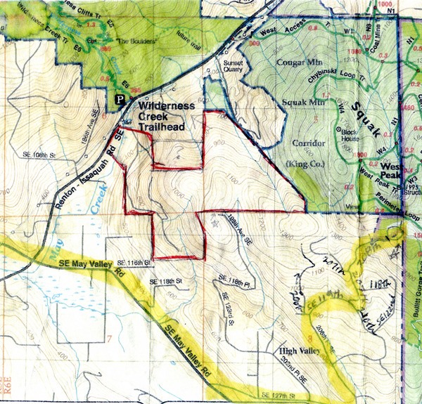 The area outlined in red on this map is the property owned by Erickson Logging. The large triangular piece to the right