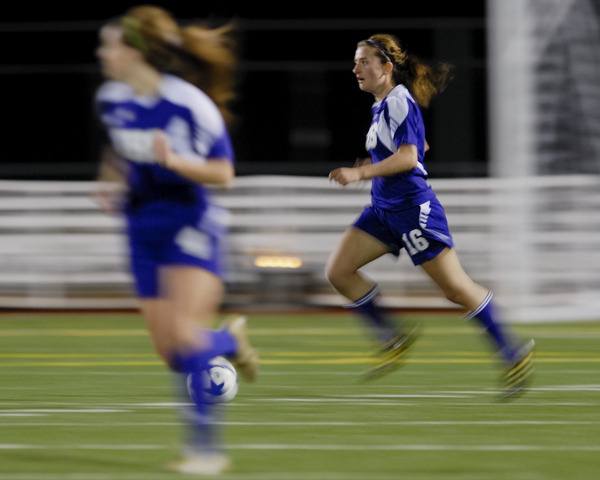 Issaquah defender Julia Knitter dribbles the ball up field in the KingCo 4A championship game.