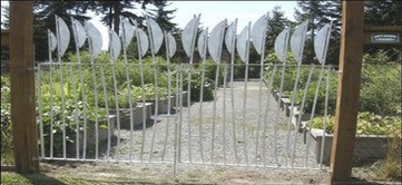 A gate designed by artist Garth Edwards has been installed at the Lower Commons Community Garden