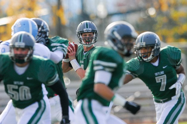 Spartans QB Max Browne (4) drops back to pass against Central Valley on Saturday. Next up for Skyline is Woodinville at the Tacoma Dome on 1 p.m. on November 26.