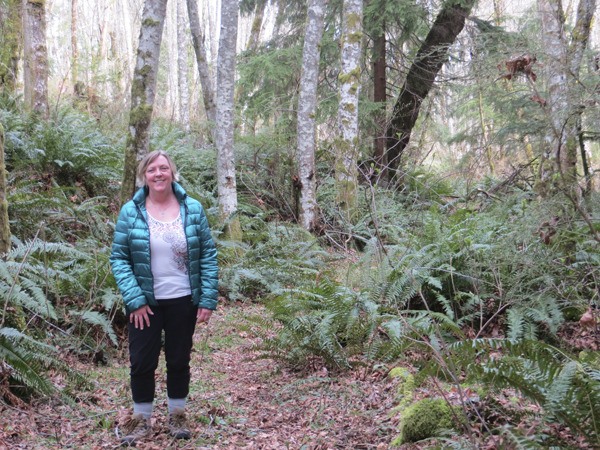 Wildlife advocate Cathy Brandt stands on the Squak Mountain property that could be logged