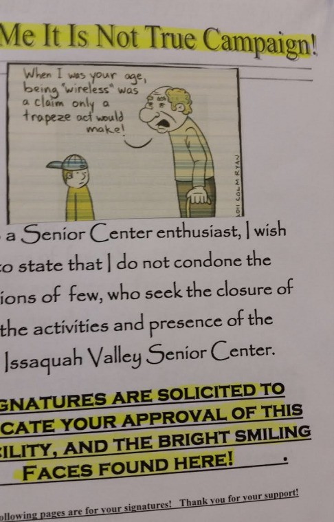 A poster allegedly hung in the Issaquah Valley Senior Center asked for members' signatures to indicate their alliance against a group that had contacted the city.