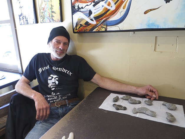 Bill Sullivan with several of his animal shaped concretions.