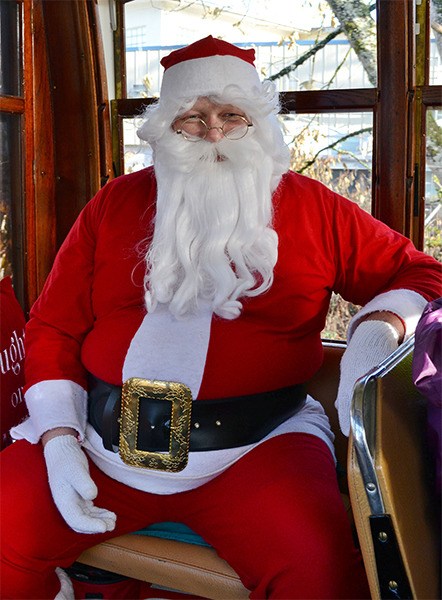 Santa rides the Issaquah Valley Trolley.