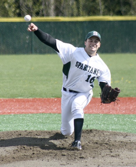 Skyline's Travis Snider hones in on home plate Tuesday afternoon. The senior held Redmond to just four hits in the Spartans' 4-3 victory.