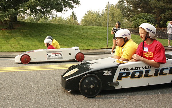 Racers in the 2015 Challenge Series Races in Sammamish let gravity do the work as they flew down Southeast 24th Street in Sammamish Aug. 22 at about 9:30 a.m.