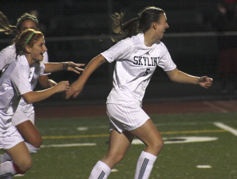 Skyline's Alexa Strom runs back to midfield after scoring her first goal of the season Tuesday night. Teammate Anna Deweirdt chases her down.