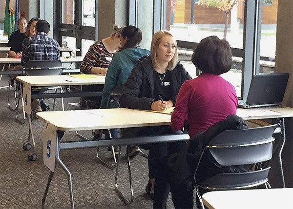 YMCA senior director Megan Worzella interviews a candidate during a Nov. 7 job fair at Sammamish City Hall.