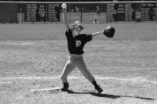 Issaquah Little League Tiger pitcher Michelle Fowler pitches in a game against the Eastlake Huskies last Saturday.