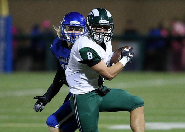 Skyline Spartans senior wide receiver Bradley Kim makes a move upfield after catching a pass in a matchup against the Bothell Cougars football team on Oct. 6. Skyline defeated Bothell 34-13. It was Skyline’s fifth consecutive victory since losing the season opener to Richland on Sept. 2.