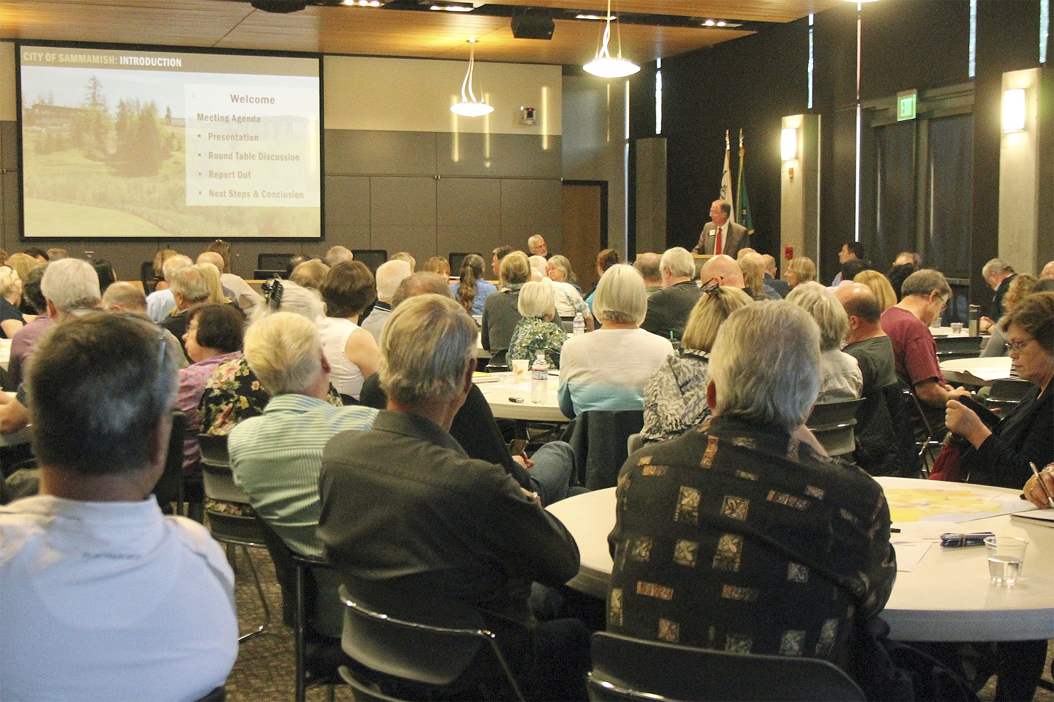 A packed house in the Sammamish Council chambers listens in as City Manager Lyman Howard speaks during a community roundtable meeting on growth Sept. 8 at City Hall (Joe Livarchik/staff photo).