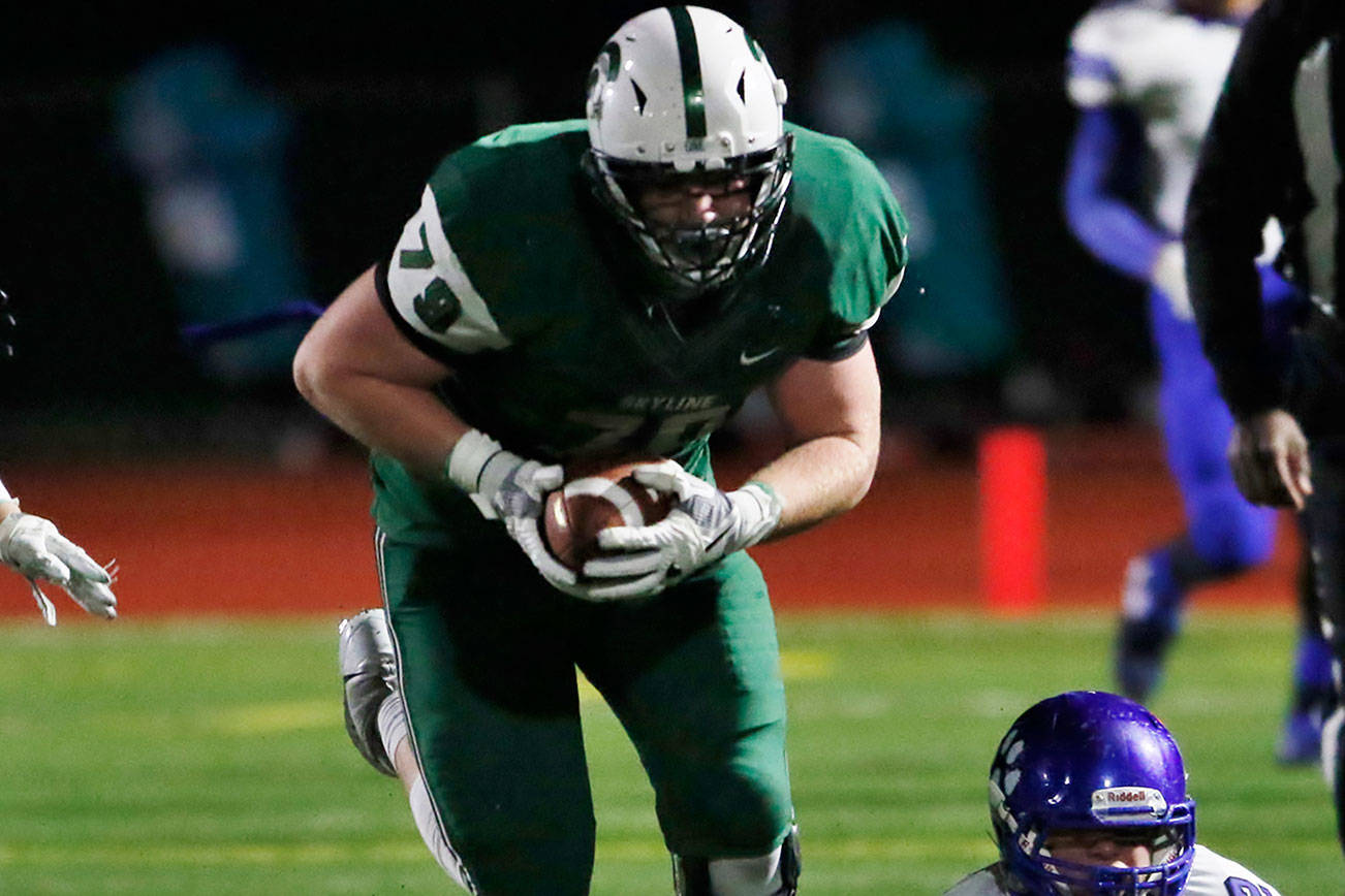 Photo courtesy of Jim Nicholson                                The Skyline Spartans defeated the Bothell Cougars 31-28 in the first round of the Class 4A state playoffs at Skyline High School in Sammamish on Nov. 10. Skyline defensive lineman Matthew Cindric (pictured) returns a fumble for a touchdown in the second quarter. Cindric finished the game with a team-high three sacks. Skyline will face Central Valley in the Class 4A quarterfinals on Nov. 17 or Nov. 18.