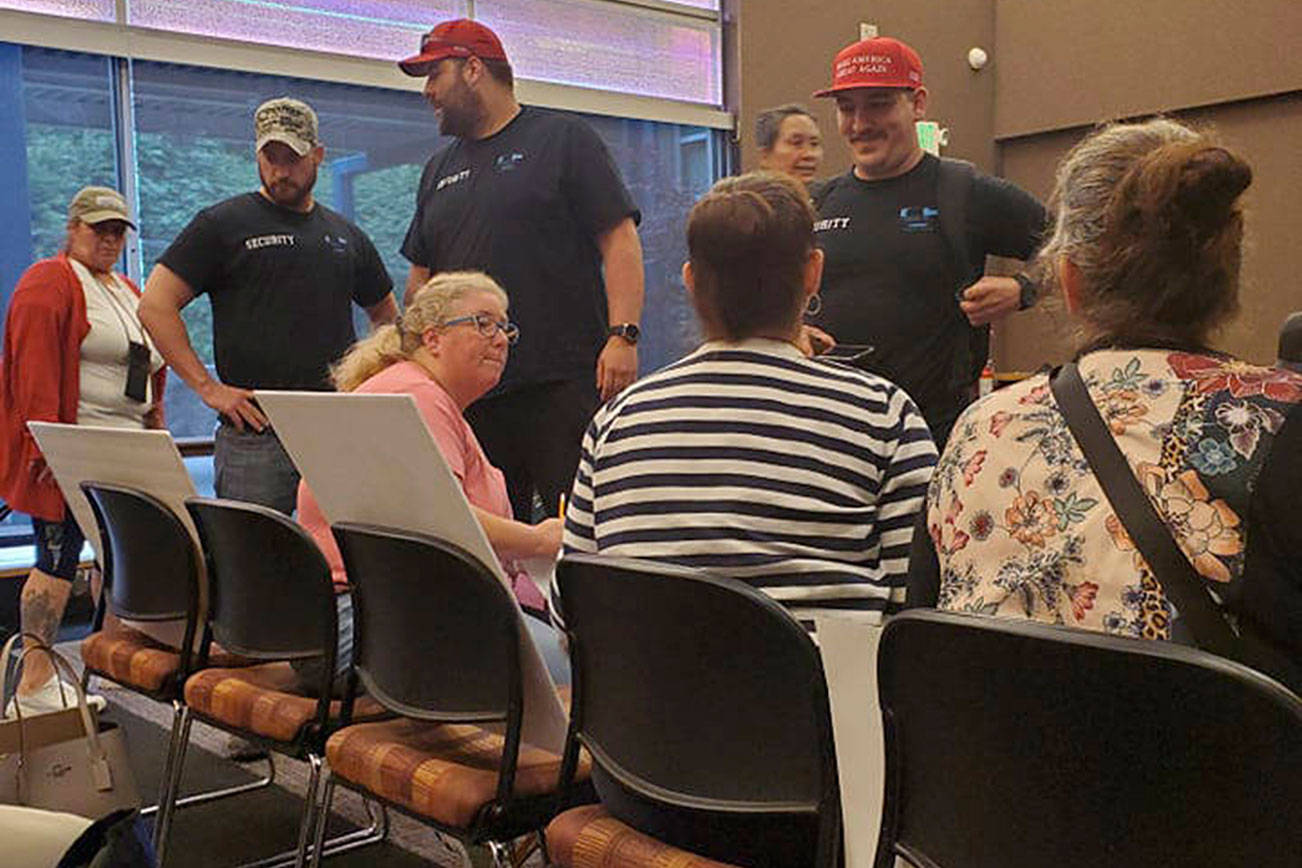 Local “Proud Boys” and others opposed to the King County Library System’s Drag Queen Story Hours showed up in Issaquah to voice their opposition to the events June 26. Courtesy photo