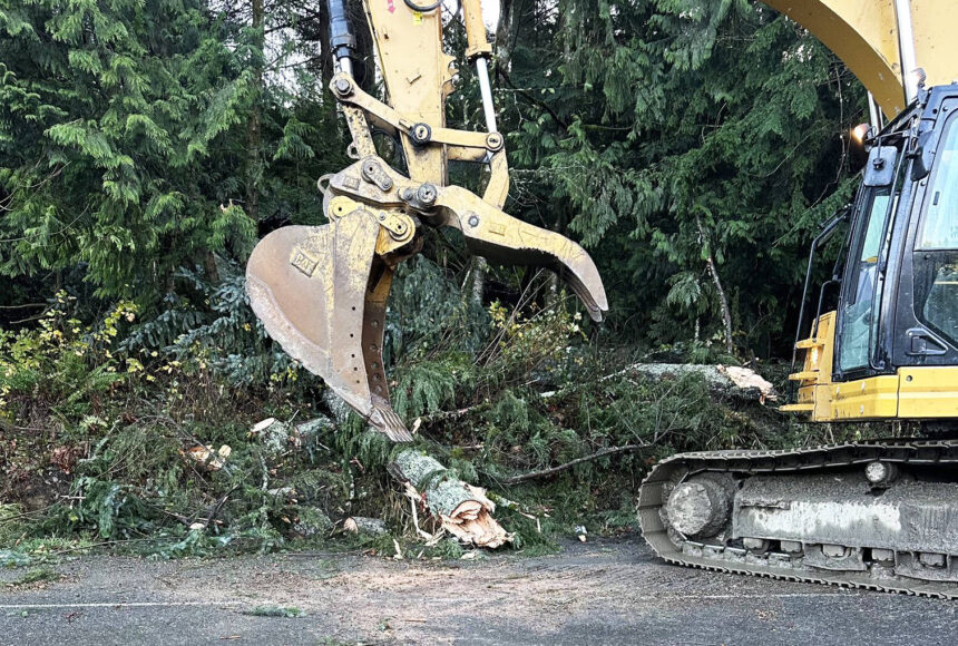 <p>Crews clear trees from State Route 18, which the Washington State Patrol closed in both directions Wednesday, Nov. 20, from Issaquah Hobart to I-90 over Tiger Mountain because of fallen trees during a windstorm. COURTESY PHOTO, Washington State Patrol</p>